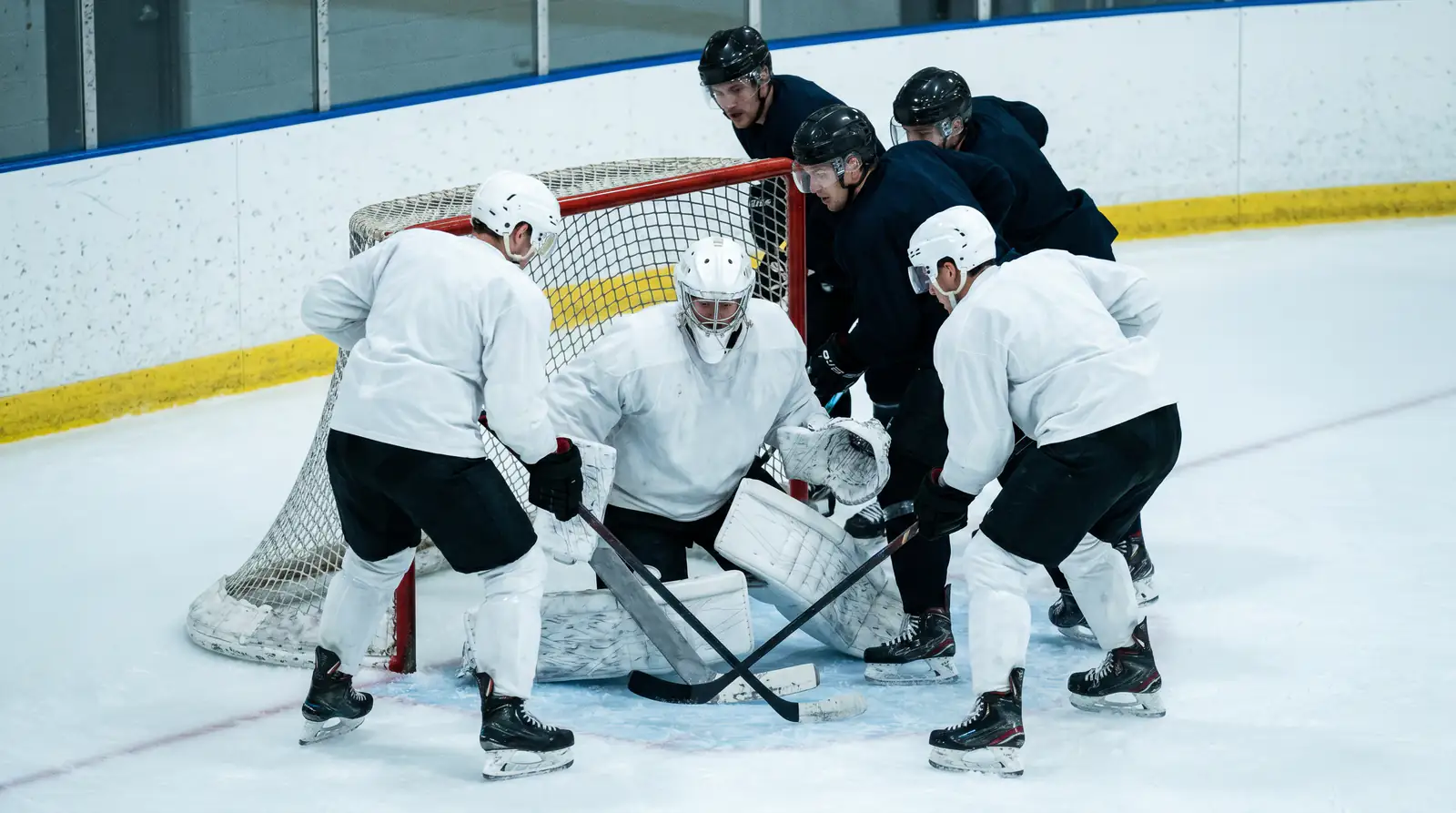 NHL game script with defensive zone pressure that suppresses SOG output for top-line forwards