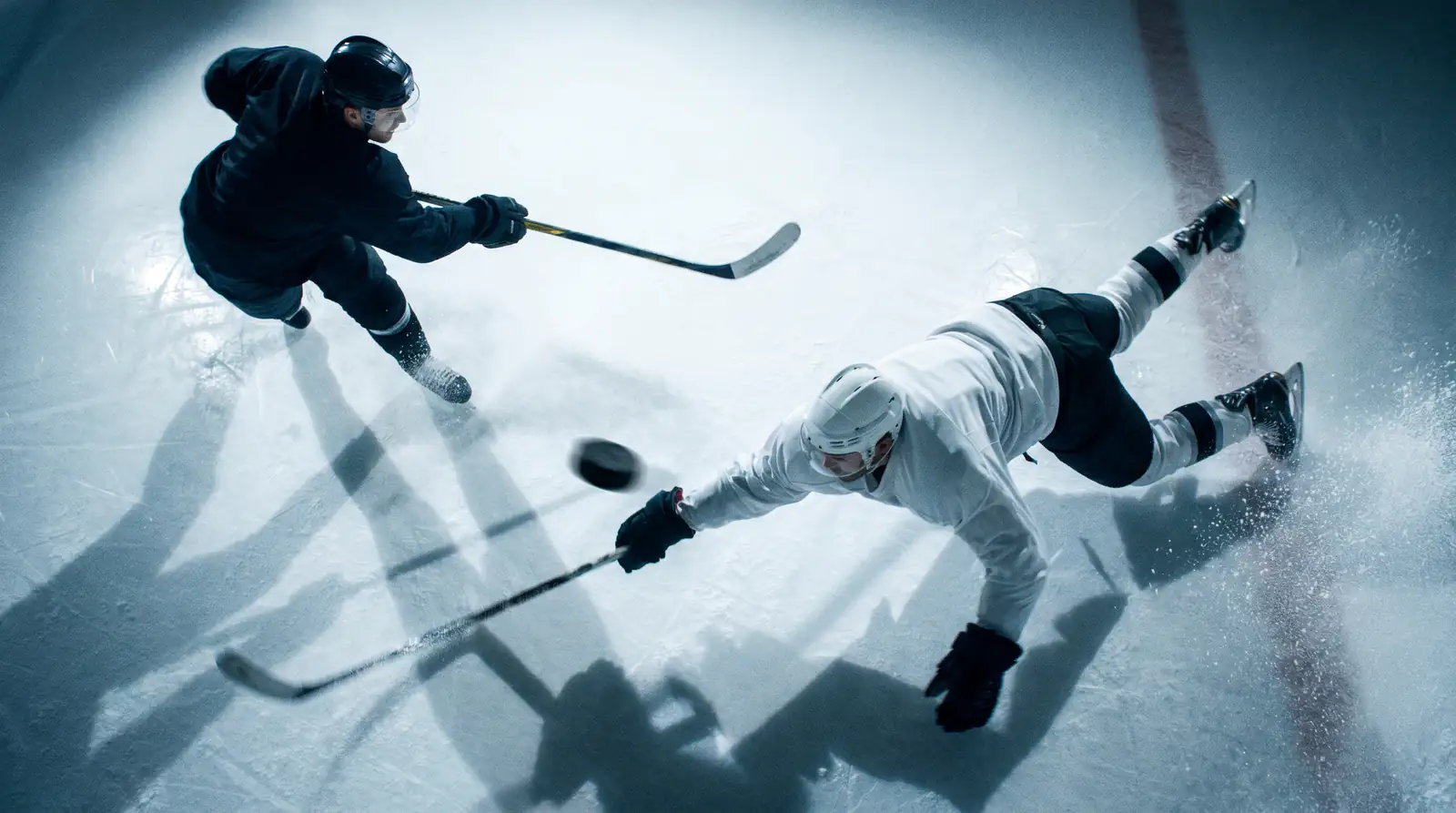 NHL penalty killer blocking a shot at the point during a penalty kill